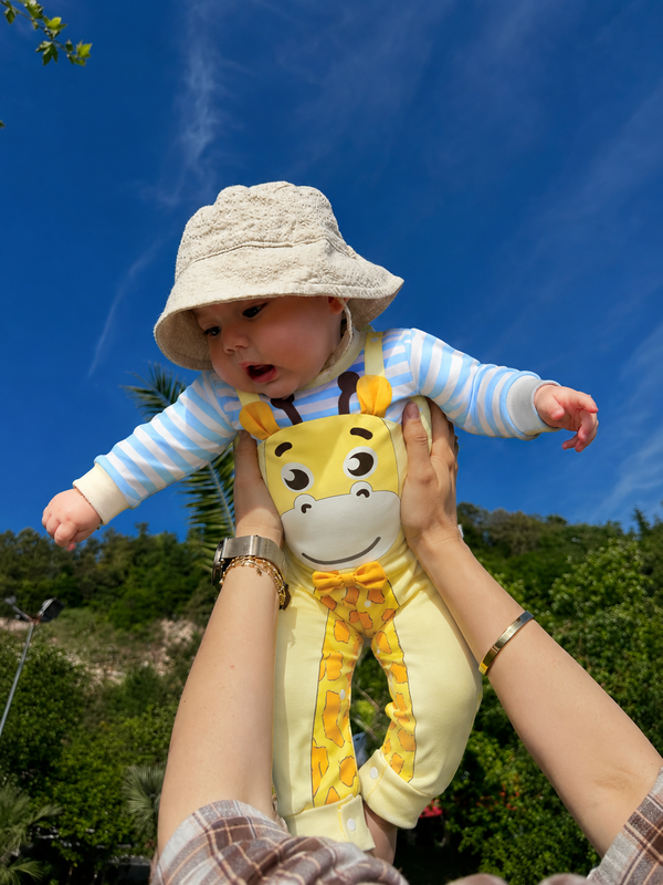 Lucy G. | Giraffe, 6–9M